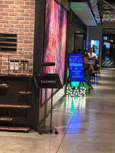 Load image into Gallery viewer, ホテルのバー前に設置されたブルーのデジタル看板