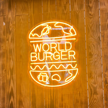 Load image into Gallery viewer, 店内に設置されたオレンジ色のネオンサインロゴ